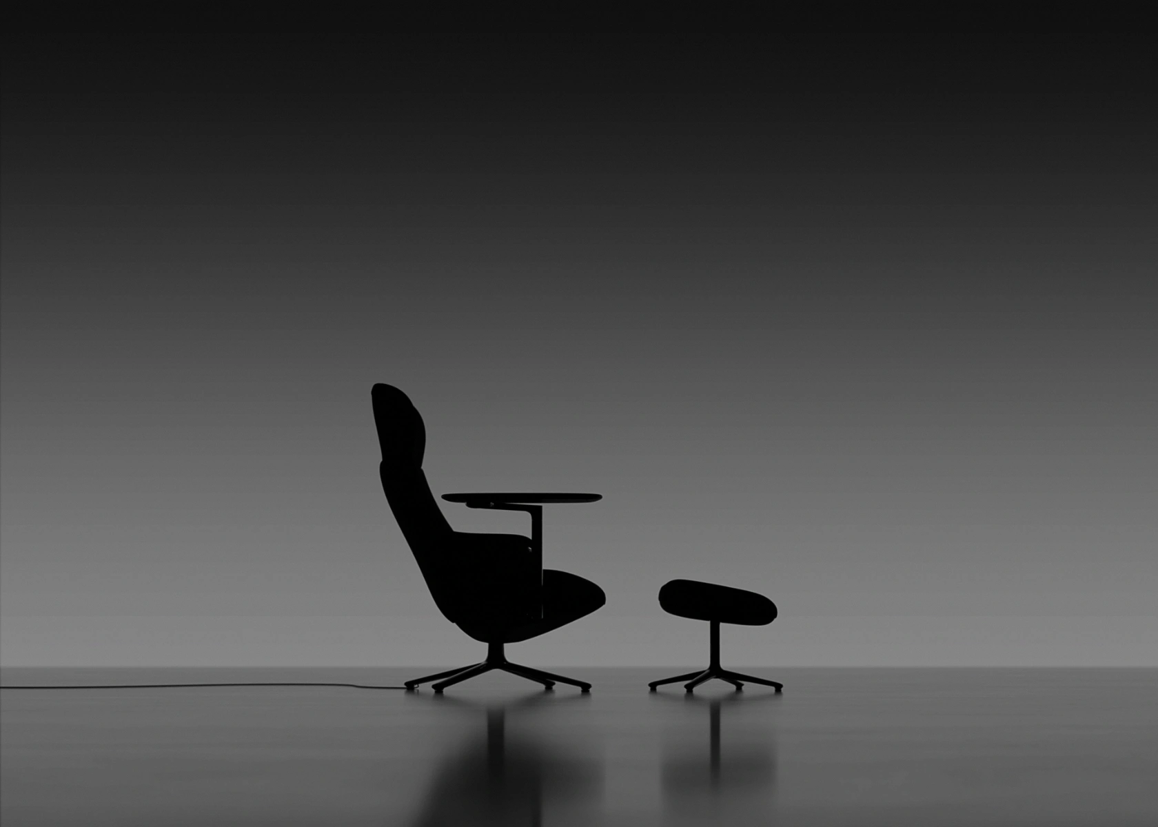 Humanscale Diffrient Lounge chair. Dark reveal shot showing the silhouette of the chair.