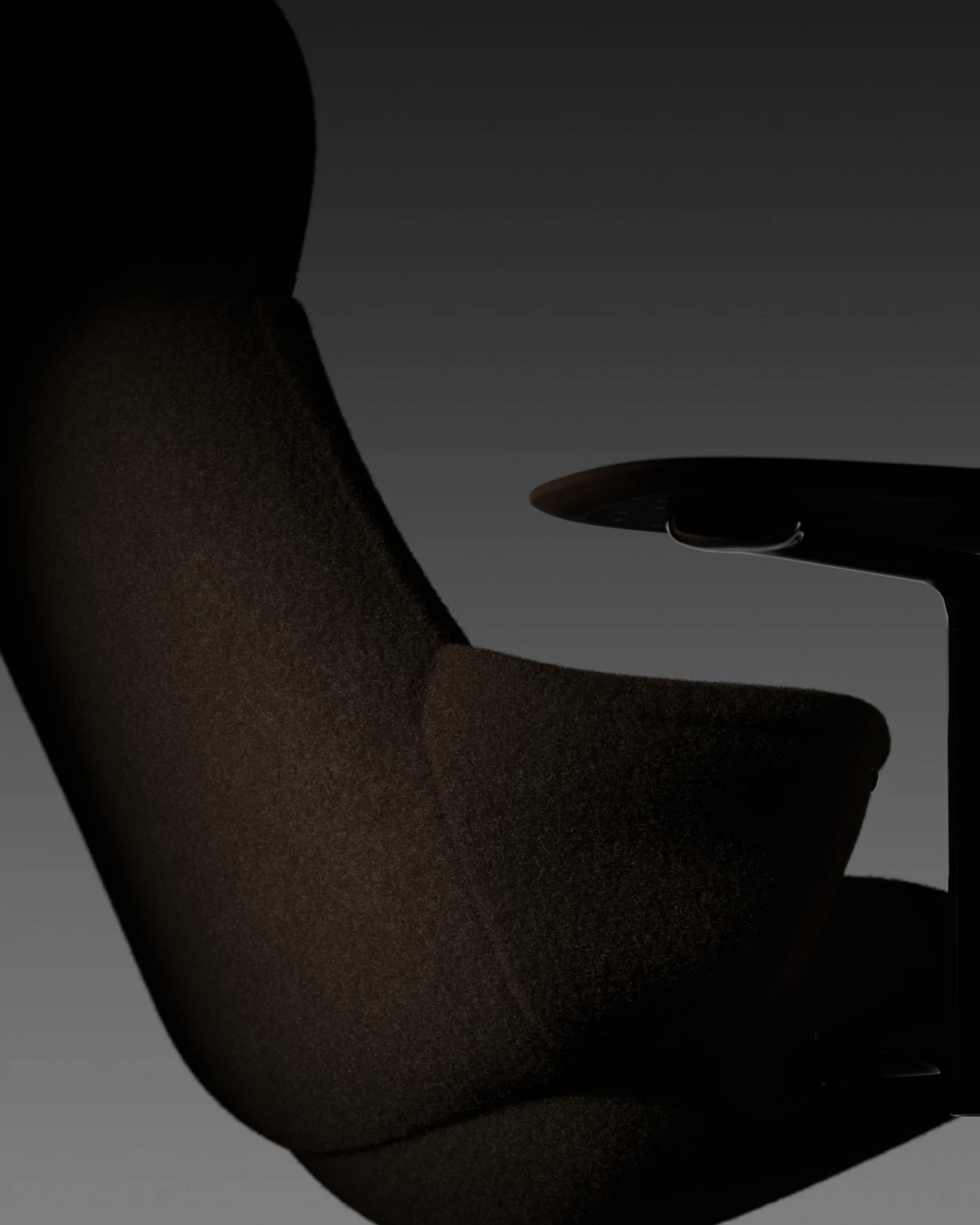 Humanscale Diffrient Lounge chair. Dark reveal shot showing the back of the chair.