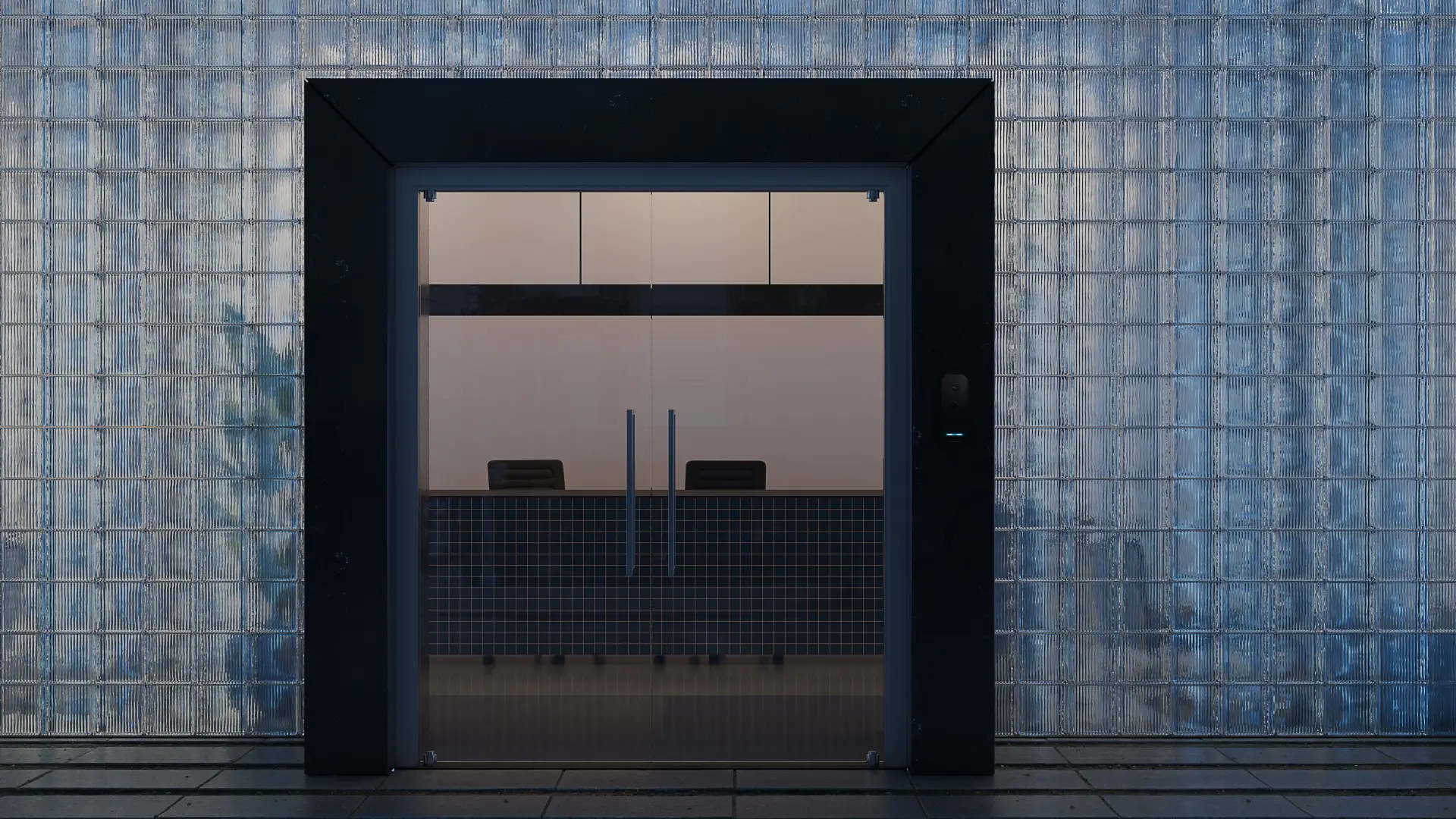 Kisi products in context. Cool office building by night, with Kisi intercom.