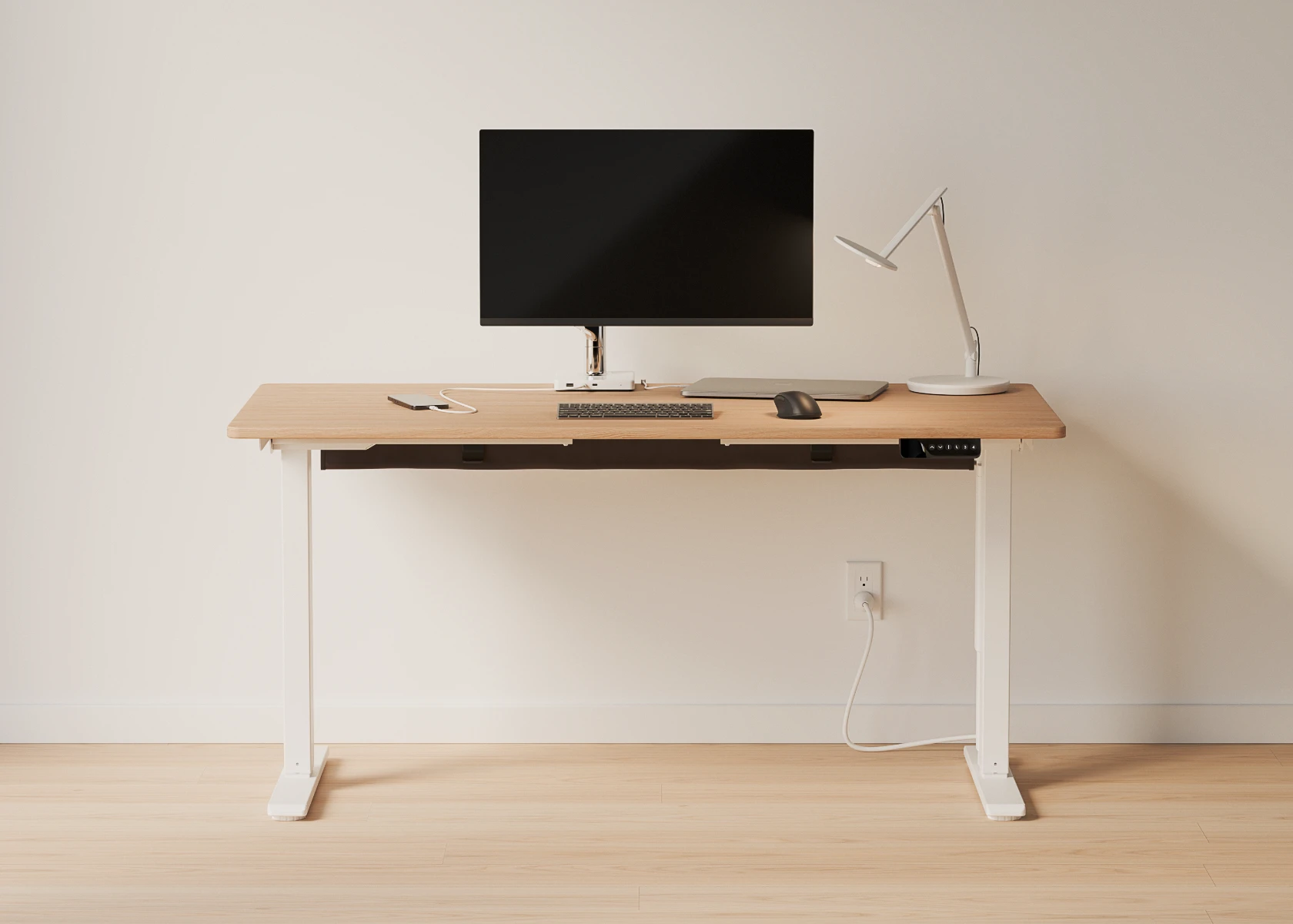Humanscale NeatTech desk cable management. Image showing an organized after.
